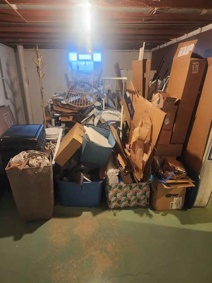 Roll-off dumpster container at job site for 4 Yard Dumpster Rental in Ada